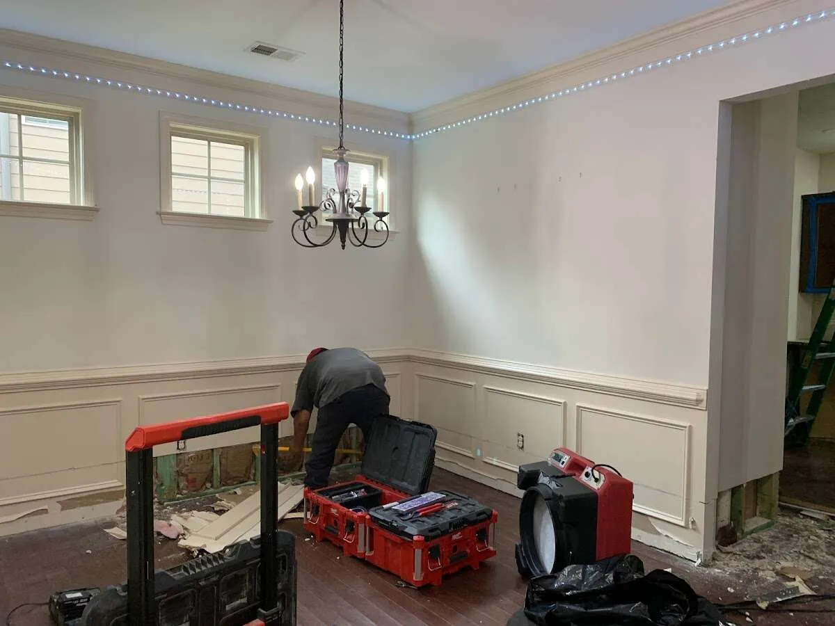 Restoration technician with professional equipment in Flower Mound